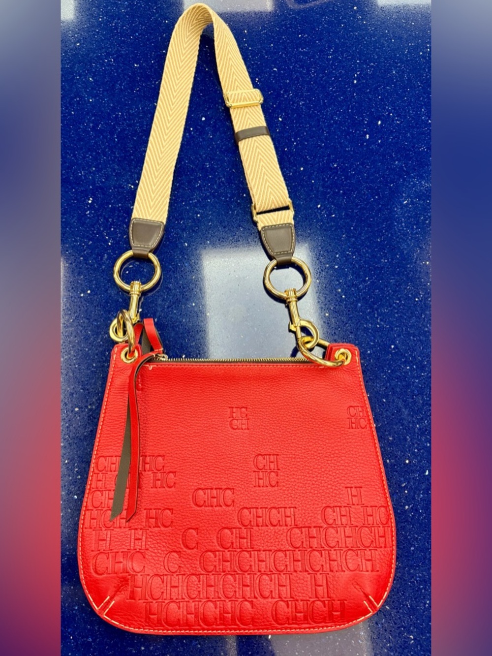 CH Carolina Herrera monogram embossed leather bag